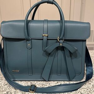 Blue Handbag with Bow Accent
